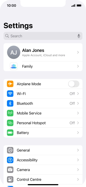 Press your Apple ID. Press your Apple ID.