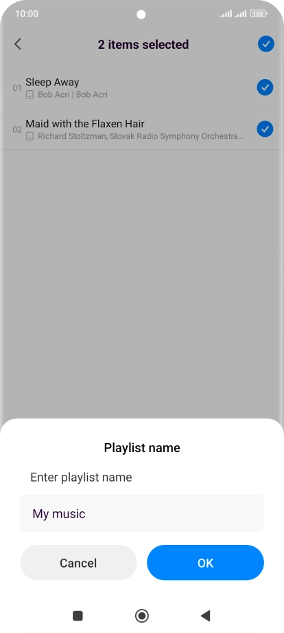 Key in a name for the playlist and press OK. Key in a name for the playlist and press OK.