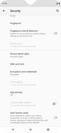Press SIM card lock. Press SIM card lock.