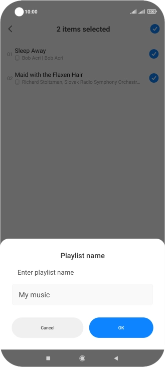 Key in a name for the playlist and press OK. Key in a name for the playlist and press OK.