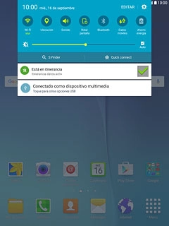 Desliza el dedo hacia abajo por la pantalla desde la parte superior de la tablet.Pulsa el icono de ajustes.