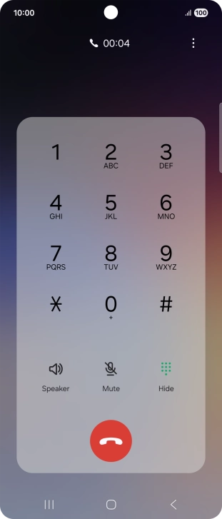 Press the end call icon.