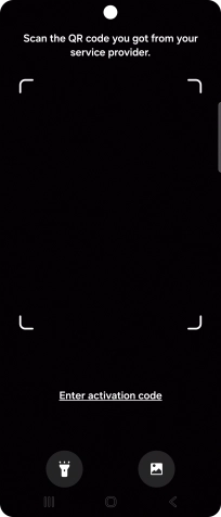 Place the QR code you've received inside the phone camera frame to scan the code. Your eSIM is transferred to your new phone over the internet.