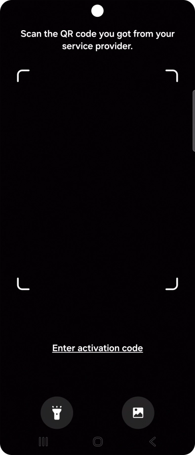 Place the QR code you've received inside the phone camera frame to scan the code. Your eSIM is transferred to your new phone over the internet.