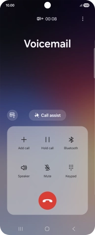 Press the end call icon.