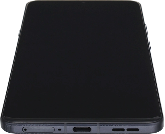 Insert the opener into the small hole in the SIM holder.