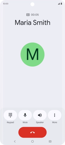 Press the end call icon.