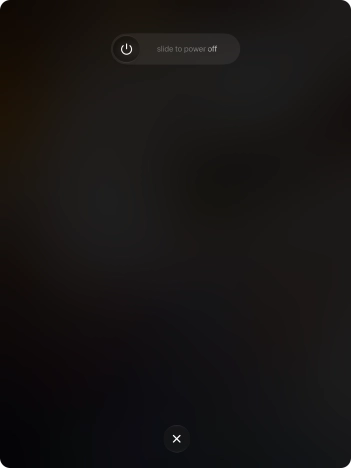 Press and drag the power off icon right.