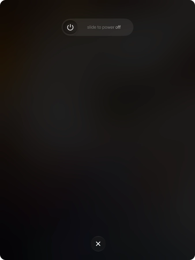 Press and drag the power off icon right.