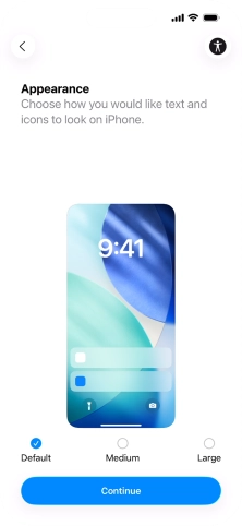 Select the required text and icon size on your phone and press Continue.