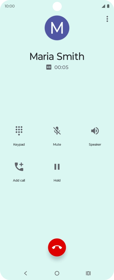Press the end call icon.