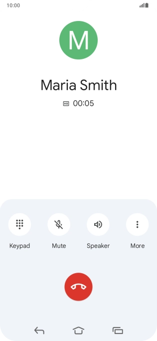 Press the end call icon.