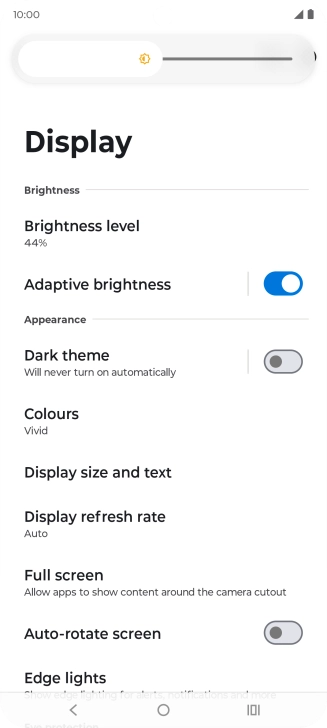 Drag the indicator right or left to set the brightness manually.