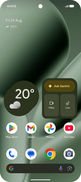 The alarm icon shows that the alarm is set.