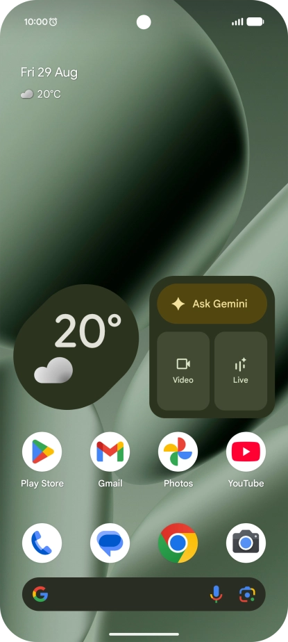 The alarm icon shows that the alarm is set.