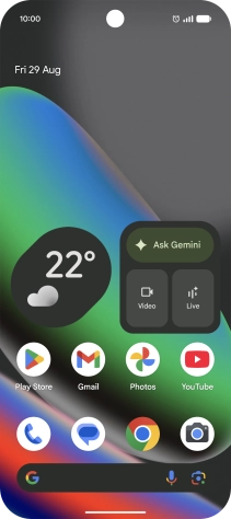 The alarm icon shows that the alarm is set.