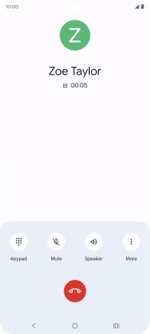 Press the end call icon.