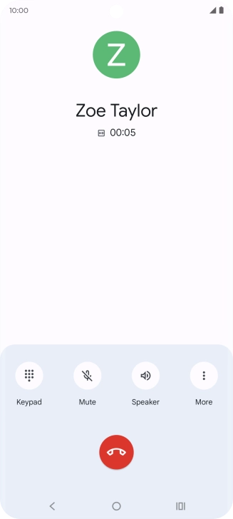 Press the end call icon.