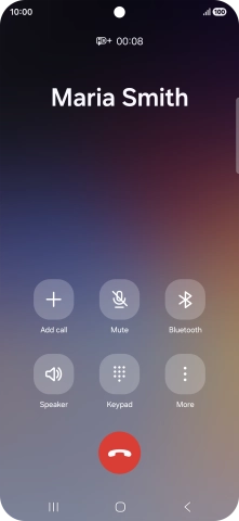 Press the end call icon.