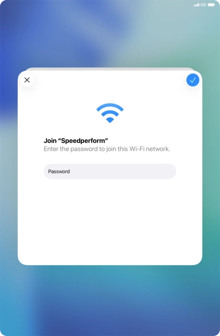 Key in the password for the Wi-Fi network and press the confirm icon.