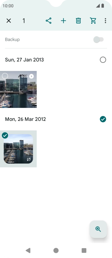 Press the required pictures or videos to select them.