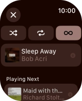 Press the shuffle icon. Press the shuffle icon.