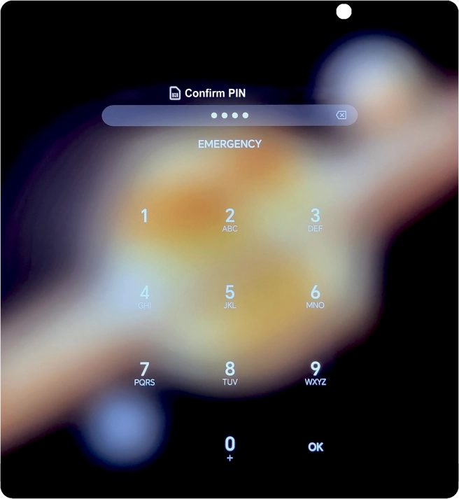 Key in the new PIN again and press OK.