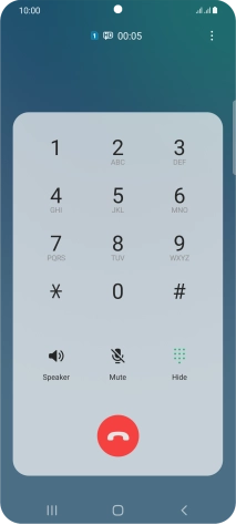 Press the end call icon.