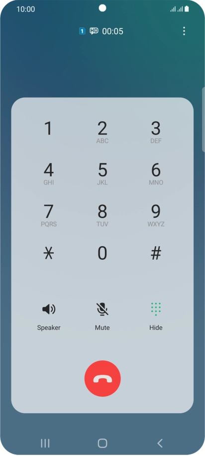 Press the end call icon.