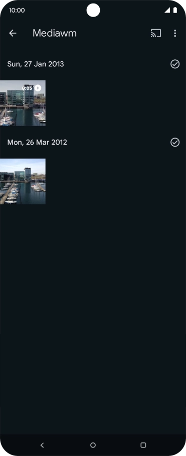 Press and hold any picture or video clip.