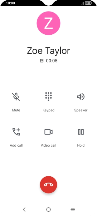 Press the end call icon.