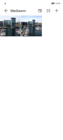 Press and hold any picture or video clip.