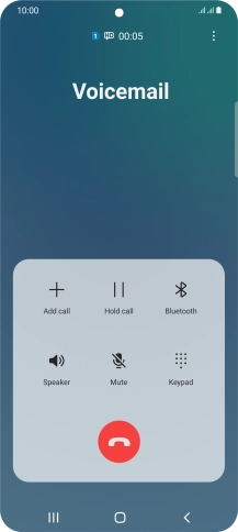 Press the end call icon.