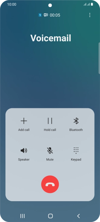 Press the end call icon.