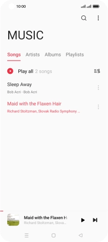 Press the song title at the bottom of the screen.