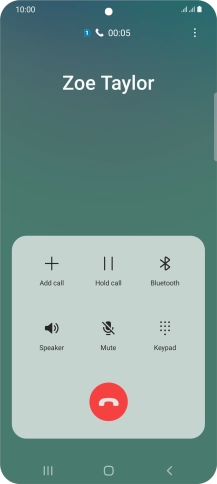 Press the end call icon.