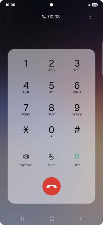 Press the end call icon.