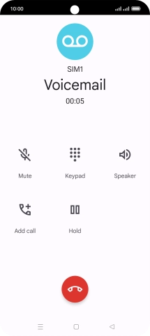 Press the end call icon.