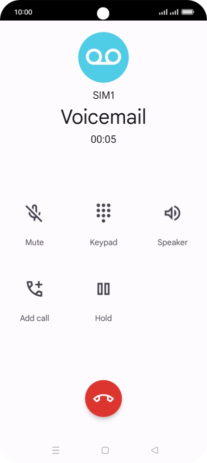 Press the end call icon.
