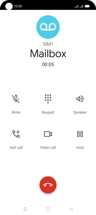 Press the end call icon.
