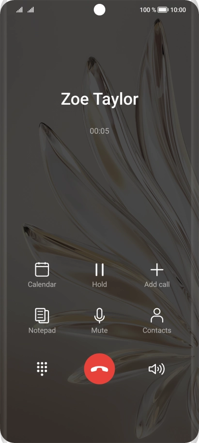 Press the end call icon.