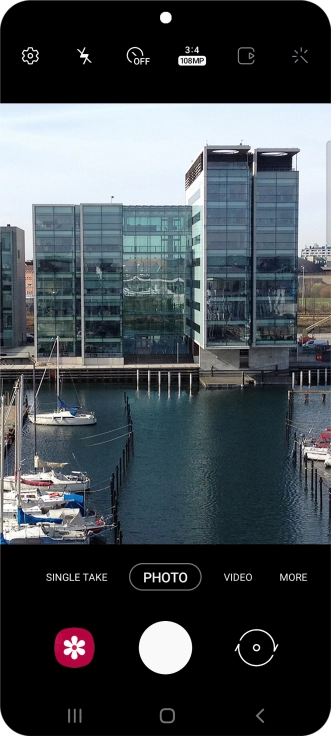 Press PHOTO. Press PHOTO.