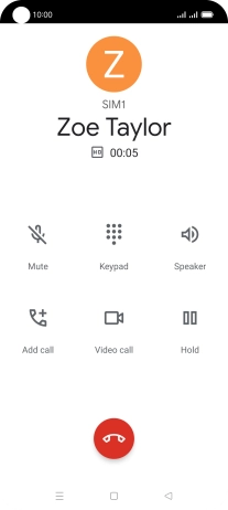 Press the end call icon.