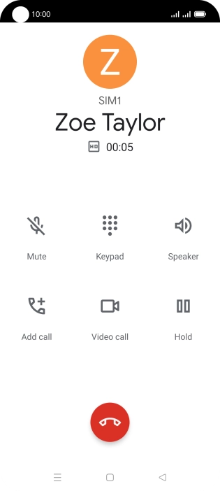 Press the end call icon.
