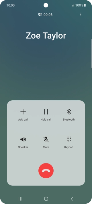 Press the end call icon.
