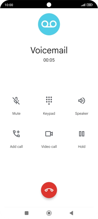 Press the end call icon.