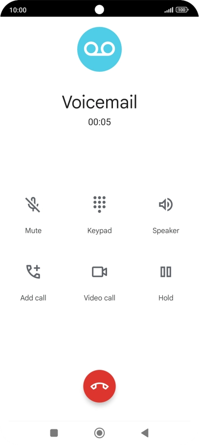 Press the end call icon.