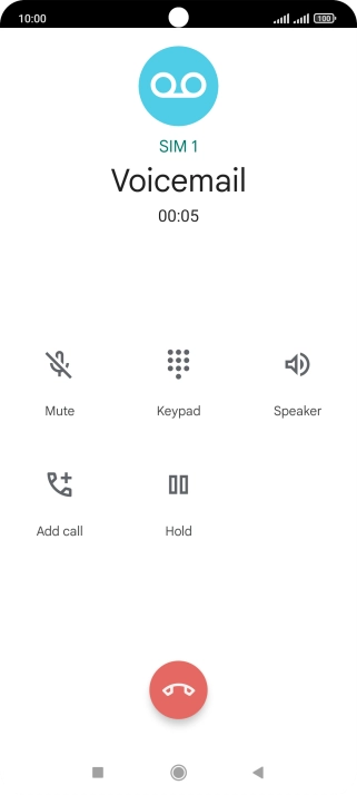 Press the end call icon.