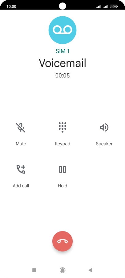 Press the end call icon.
