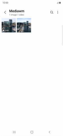 Press the required picture or video clip. Press the required picture or video clip.